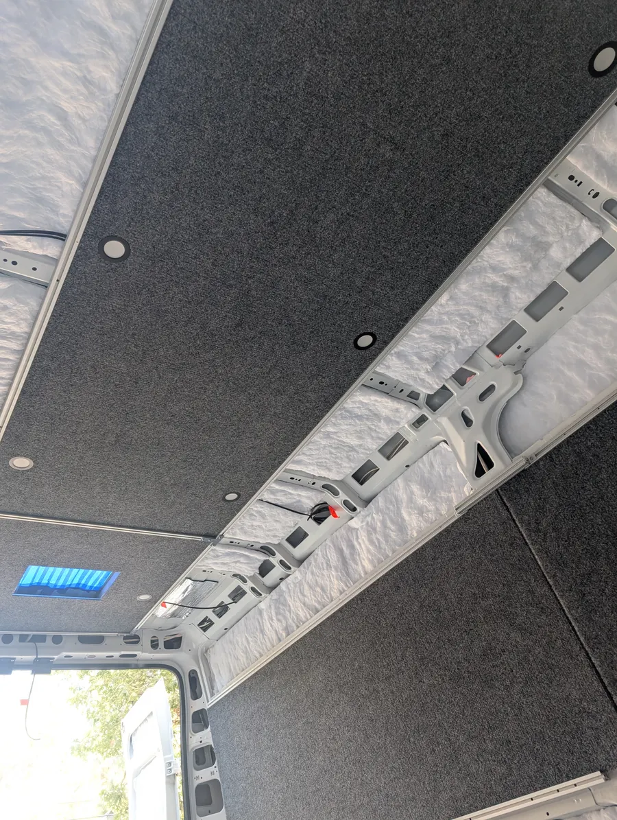 Charcoal headliner panels with recessed LED lighting — Big Bear Camper Vans build