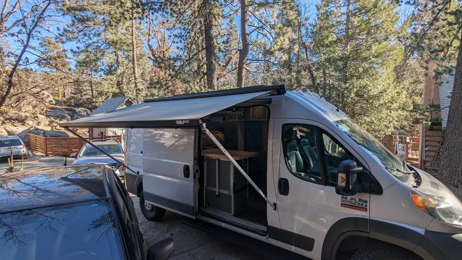 Fiamma F45s awning deployed on a ProMaster 2500 — Big Bear Camper Vans build