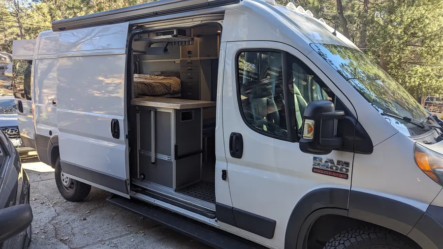 Ram ProMaster 2500 with the galley open to the slider — Big Bear Camper Vans build